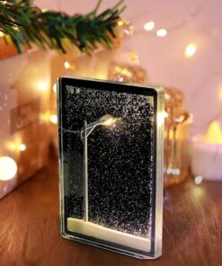 Snow Scene Night Light - Easy-to-assemble, glowing lamp post with swirling snowflakes, creating a winter wonderland.