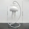 Illuminate your room with the soothing glow of the Jellyfish Table Lamp for ultimate relaxation.