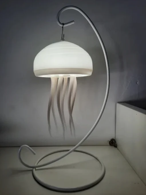 Create a serene environment in your home with the Jellyfish Table Lamp's soft glow.