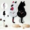 Nordic Cat Wagging Tail Wall Clock brings a smile with every wag of the cat’s tail.