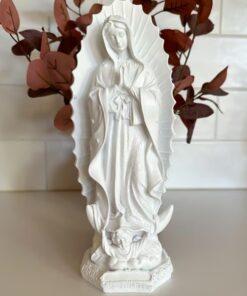 Virgen Mary Statue - Hand-sculpted with a natural marble finish, this beautiful and meaningful religious statue adds elegance to any space.